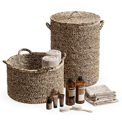 Bathroom set with baskets and skincare products
