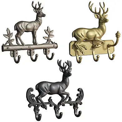 Wall-mounted key holder with a deer sculpture figurine