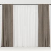 Wide brown curtains with tulle.