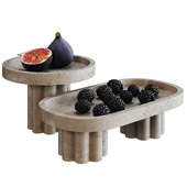 Fruits in travertine vases