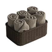 towels in a rattan basket