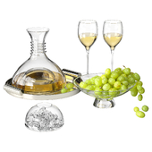 Decanter with white wine and grapes